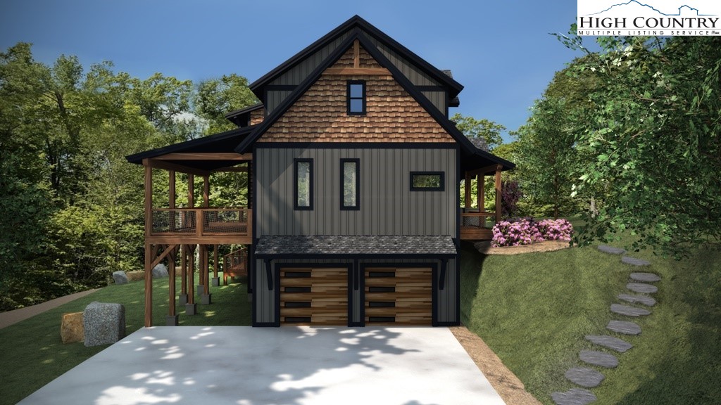 Lot 41 Mossy Creek Boone, NC 28607 - Photo 48 of 49 a front view of a house with a garden