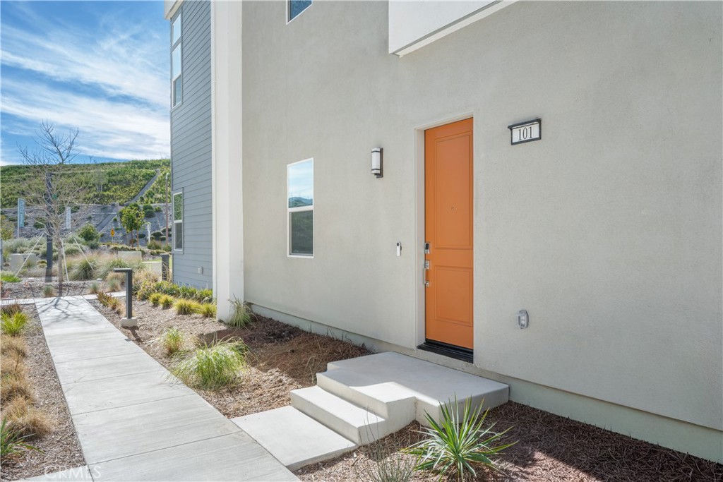 27225 Cranmore Way, Unit 101 Valencia, CA 91381 - Photo 26 of 36 a front view of a house with outdoor space
