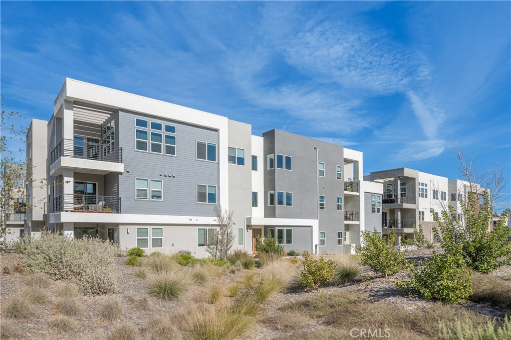 27225 Cranmore Way, Unit 101 Valencia, CA 91381 - Photo 28 of 36 a front view of a multi story building