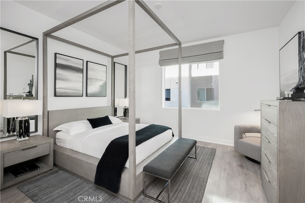 27225 Cranmore Way, Unit 101 Valencia, CA 91381 - Photo 10 of 36 a bedroom with a bed and a couch