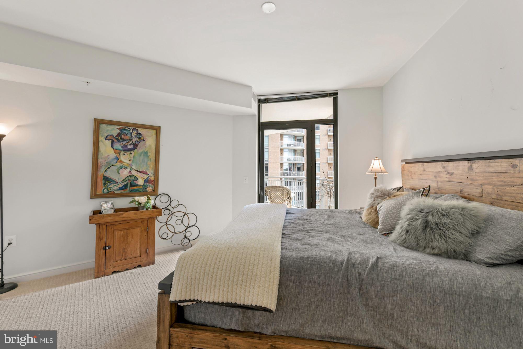11990 Market Street, Unit 611 Reston, VA 20190 - Photo 17 of 50 Primary Bedroom