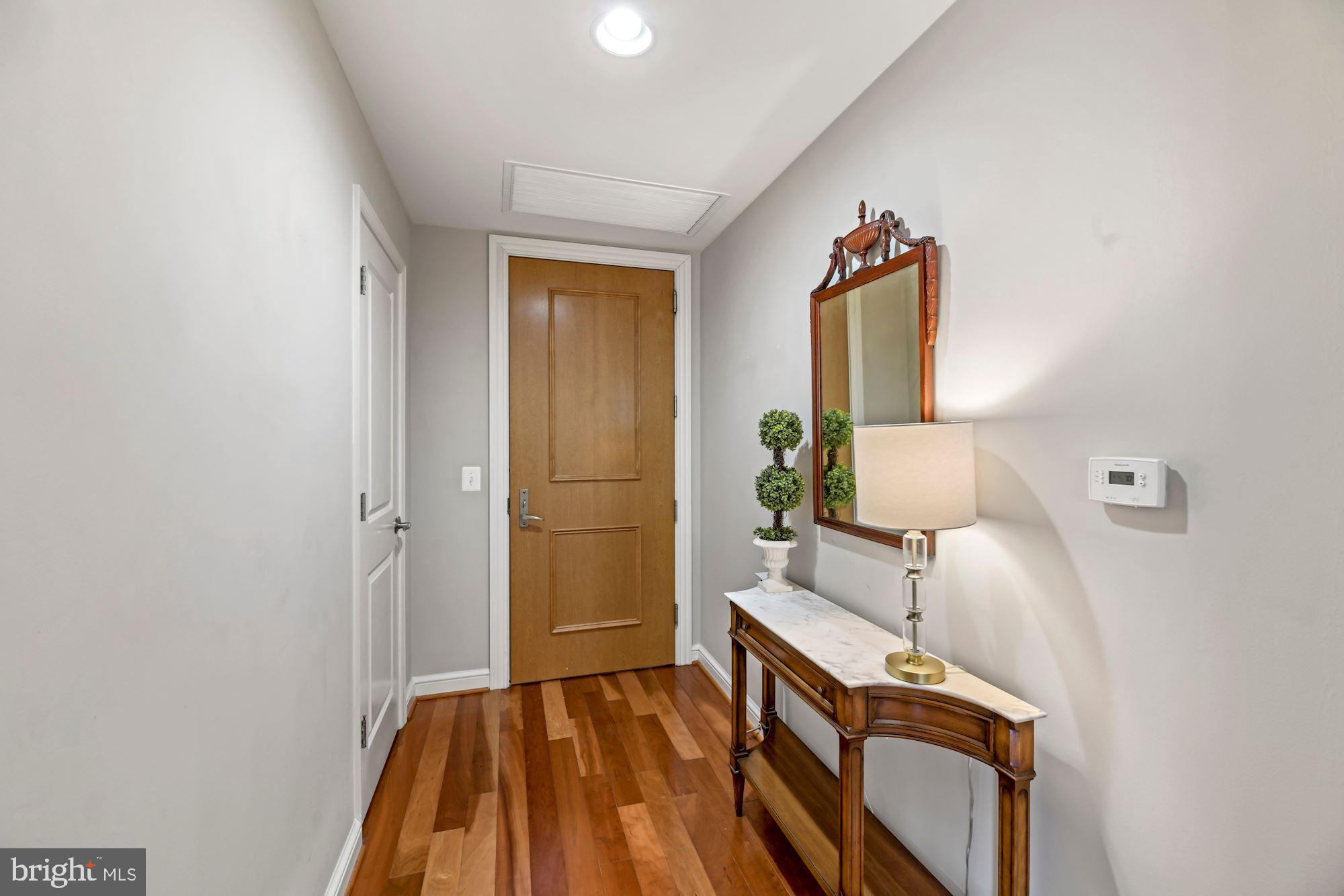 11990 Market Street, Unit 611 Reston, VA 20190 - Photo 4 of 50 Foyer