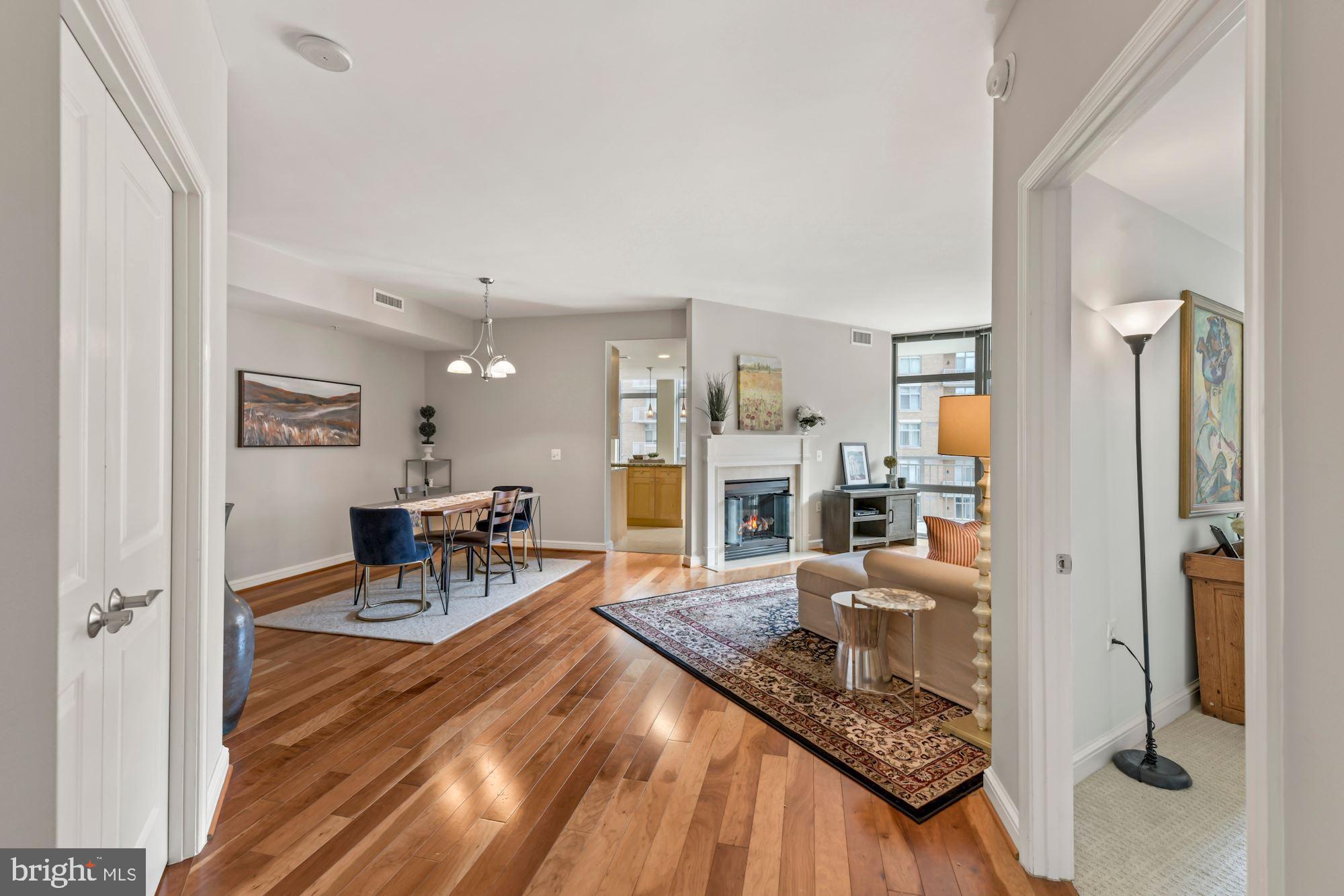 11990 Market Street, Unit 611 Reston, VA 20190 - Photo 5 of 50 Open Living/Dining Area