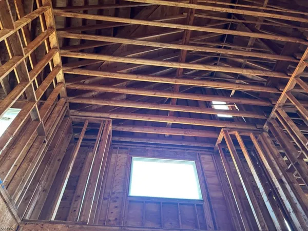a view of a wooden door of the house
