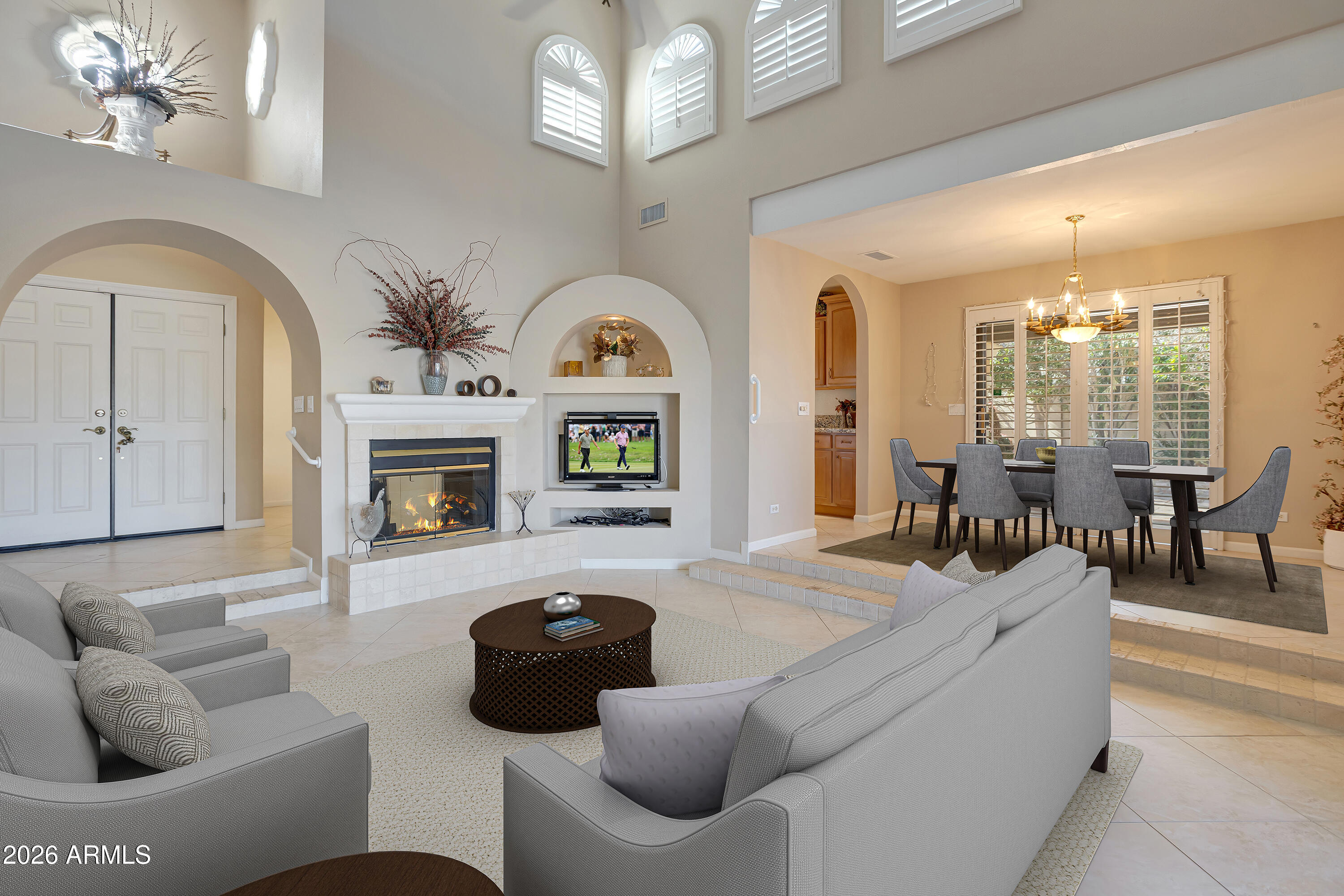 4610 East Monte Way Phoenix, AZ 85044 - Photo 11 of 44 a living room with furniture and a fireplace