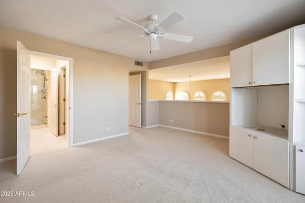 a view of an empty room with a window