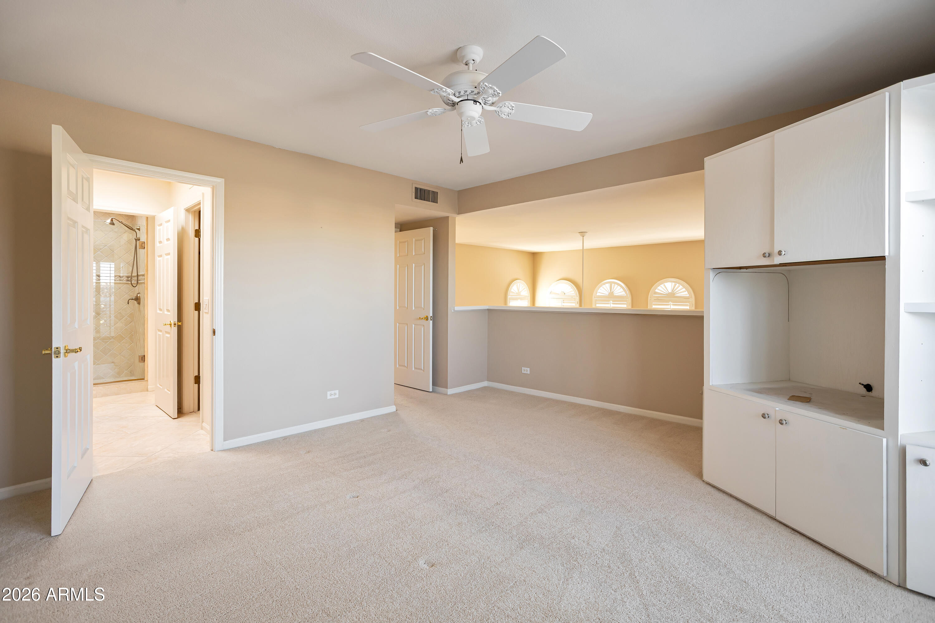 4610 East Monte Way Phoenix, AZ 85044 - Photo 24 of 44 a view of an empty room with a window