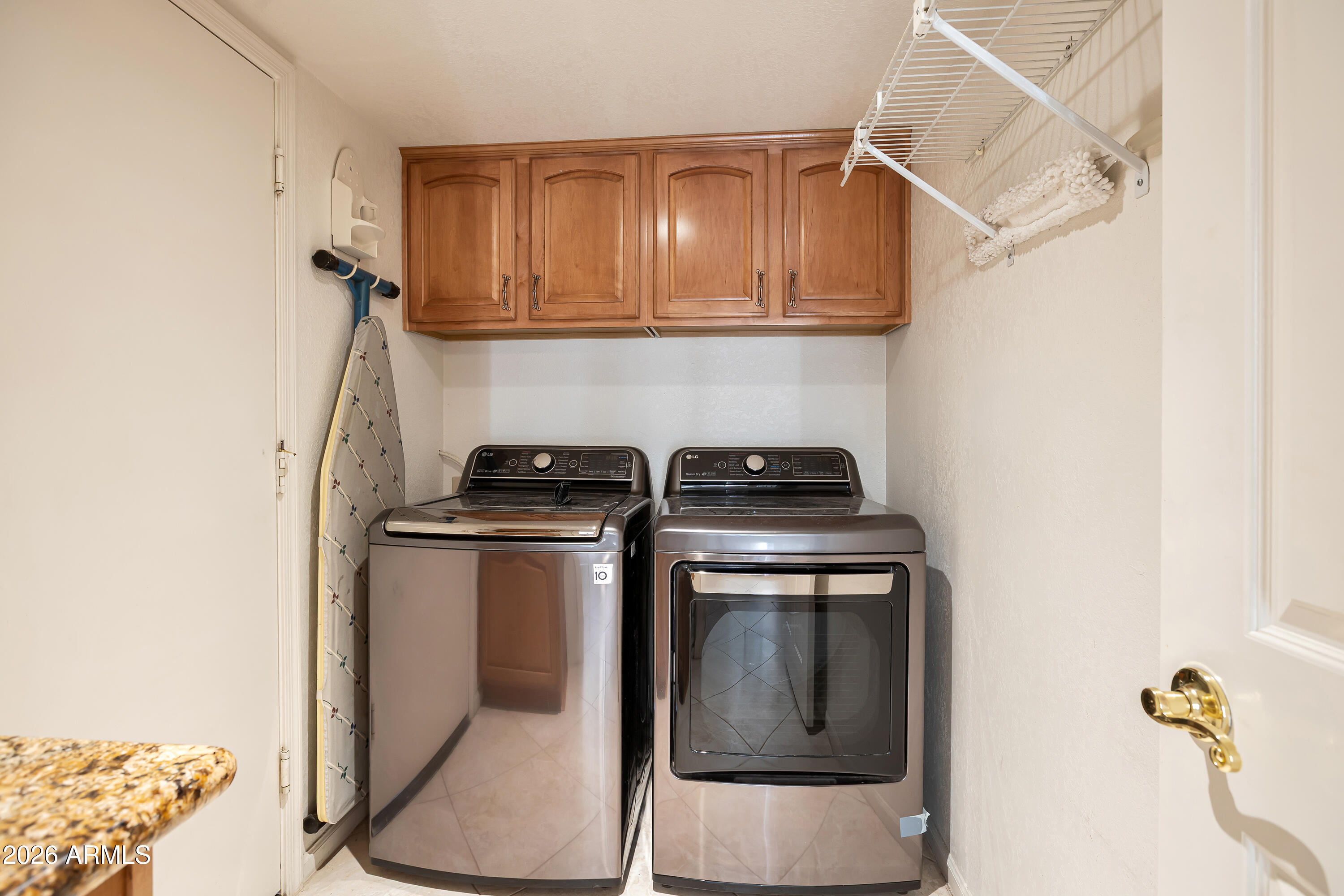 4610 East Monte Way Phoenix, AZ 85044 - Photo 28 of 44 a utility room with dryer and washer