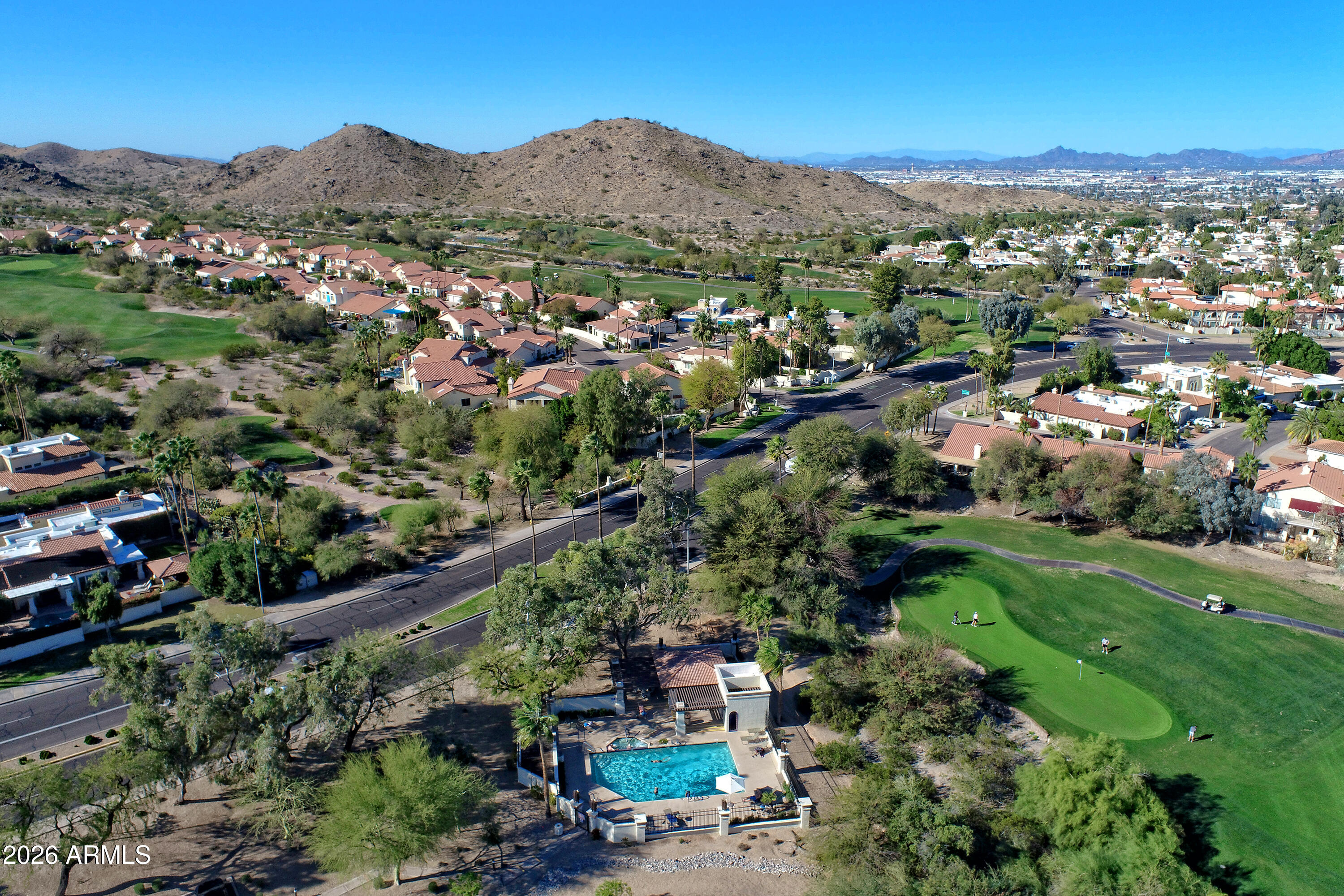 4610 East Monte Way Phoenix, AZ 85044 - Photo 34 of 44 an aerial view of residential houses and outdoor space