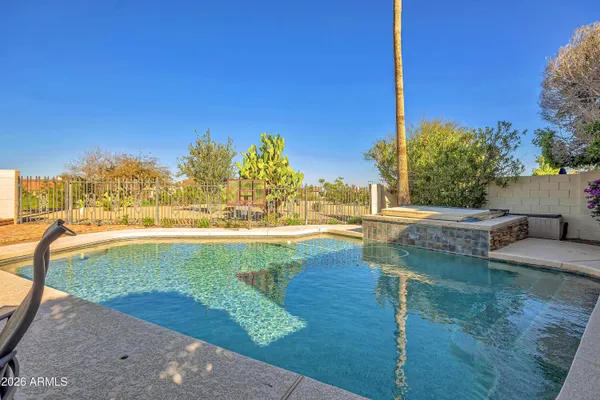 a view of a lake with a sitting area