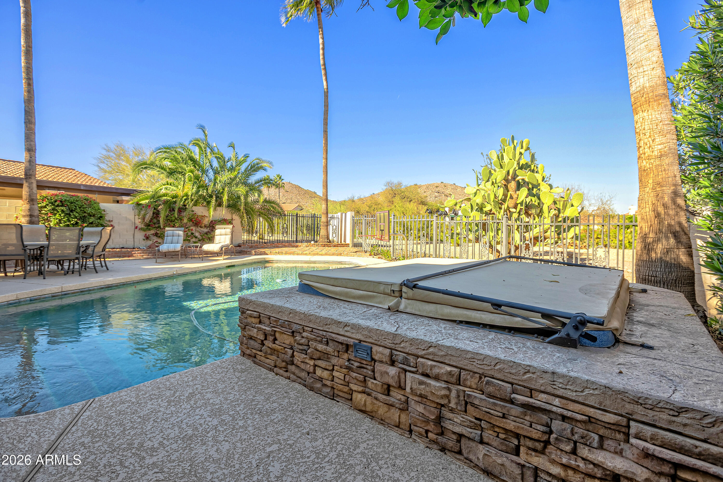 4610 East Monte Way Phoenix, AZ 85044 - Photo 39 of 44 a view of a lake with a sitting area