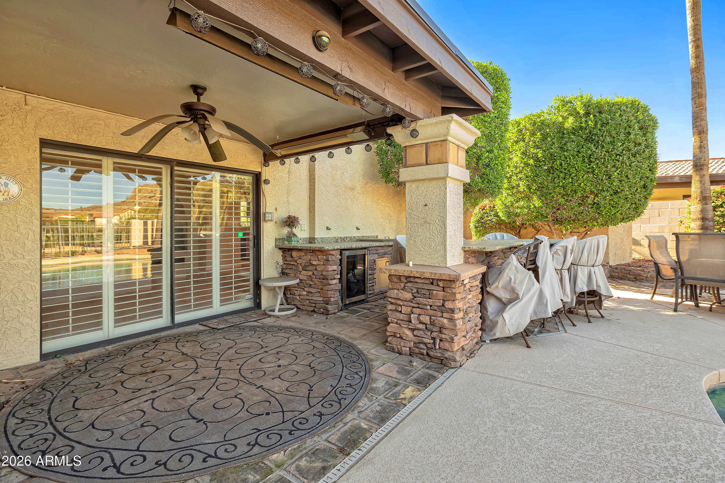4610 East Monte Way Phoenix, AZ 85044 - Photo 40 of 44 a view of a porch with furniture