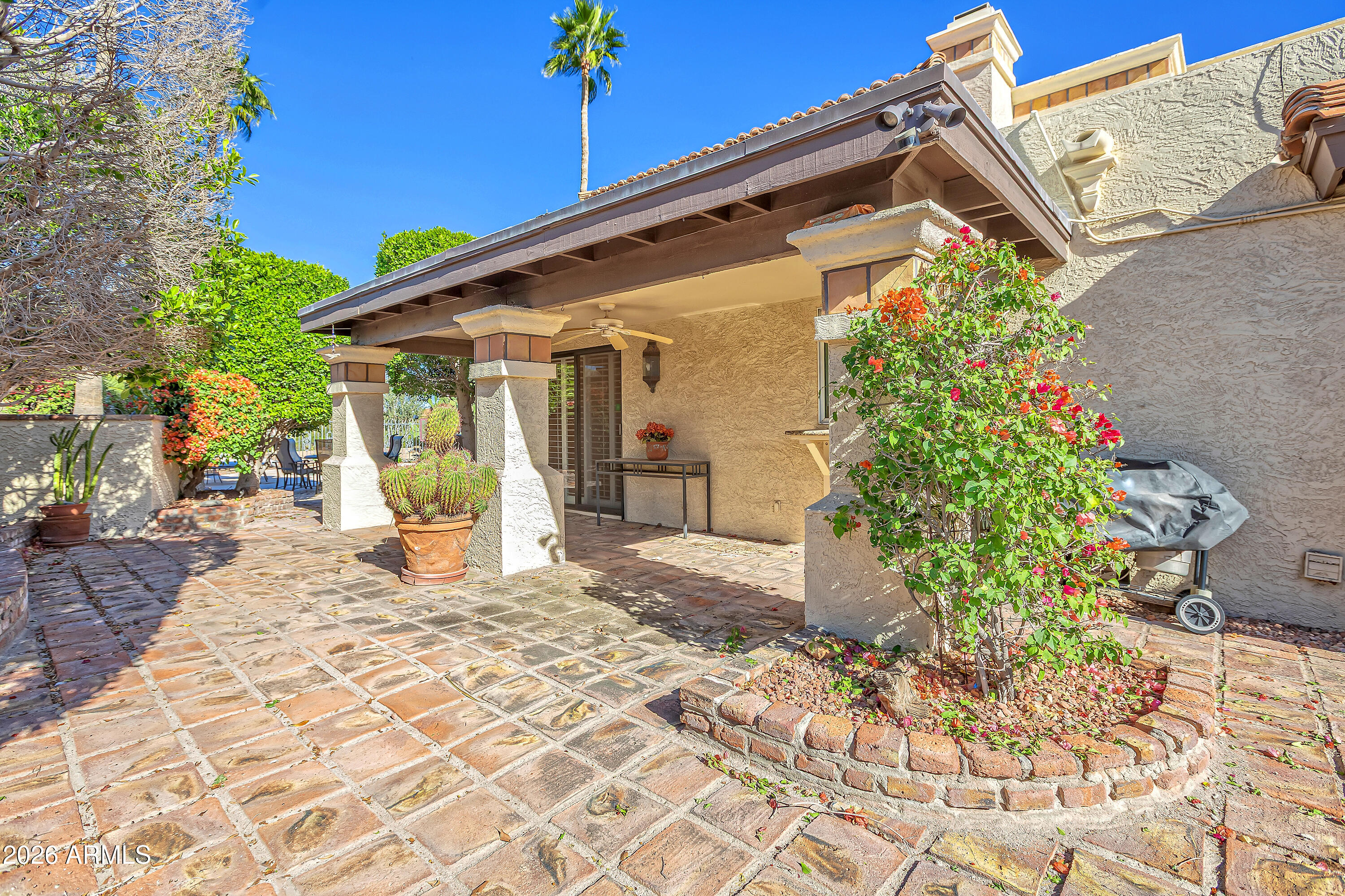 4610 East Monte Way Phoenix, AZ 85044 - Photo 43 of 44 a view of a house with a yard