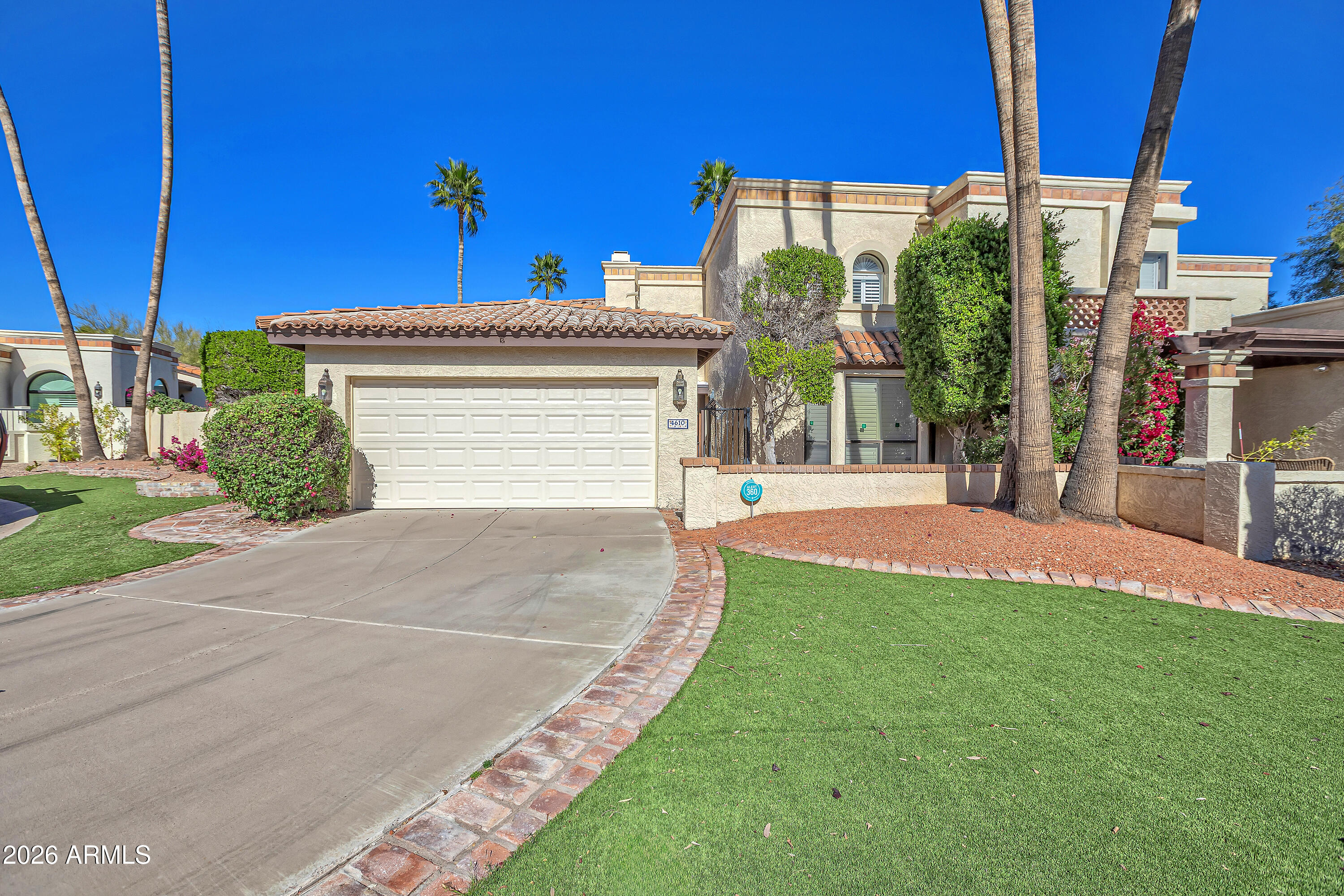 4610 East Monte Way Phoenix, AZ 85044 - Photo 6 of 44 a view of a house with a yard and table
