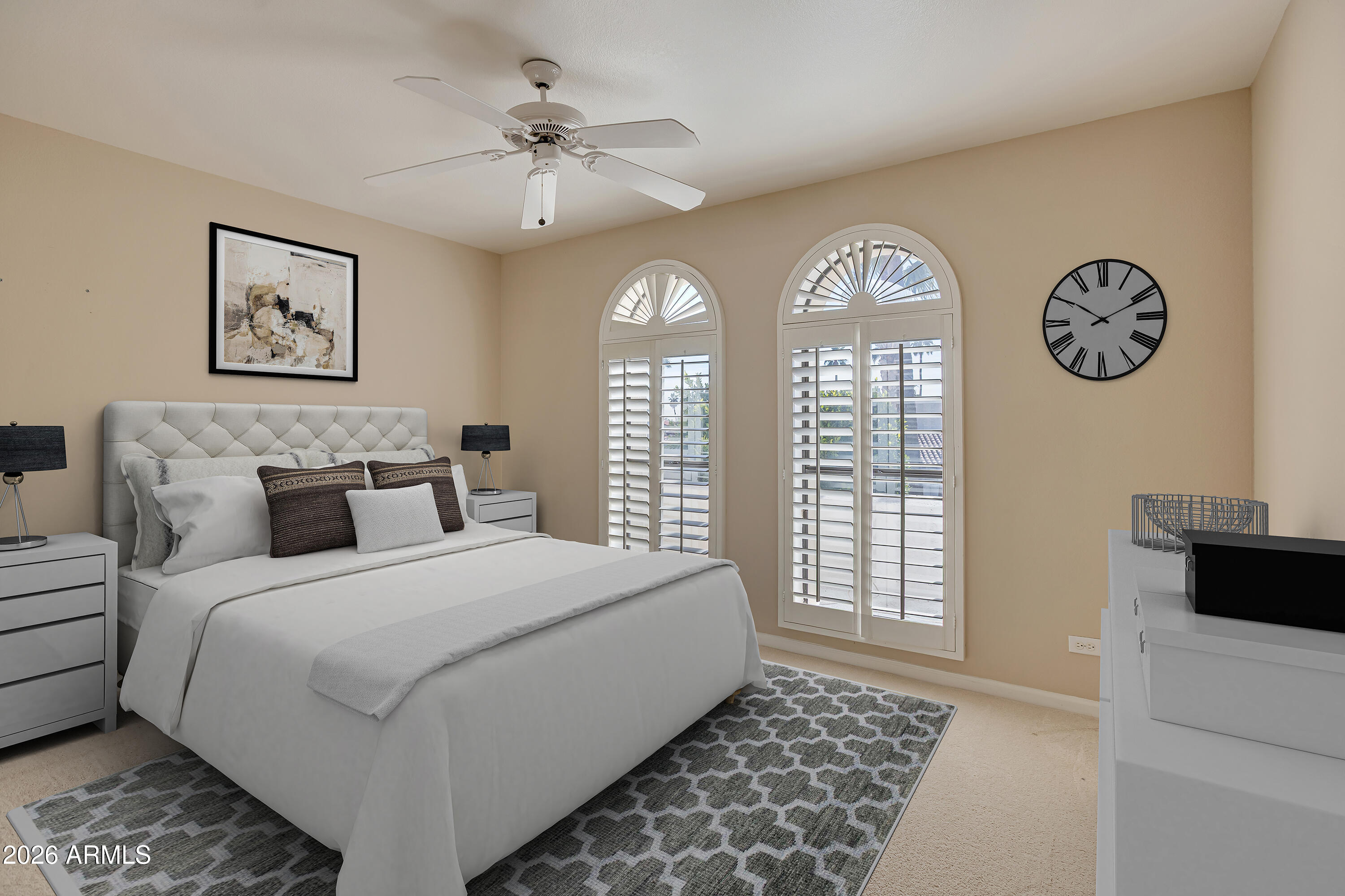 4610 East Monte Way Phoenix, AZ 85044 - Photo 8 of 44 a bedroom with a large bed and a window