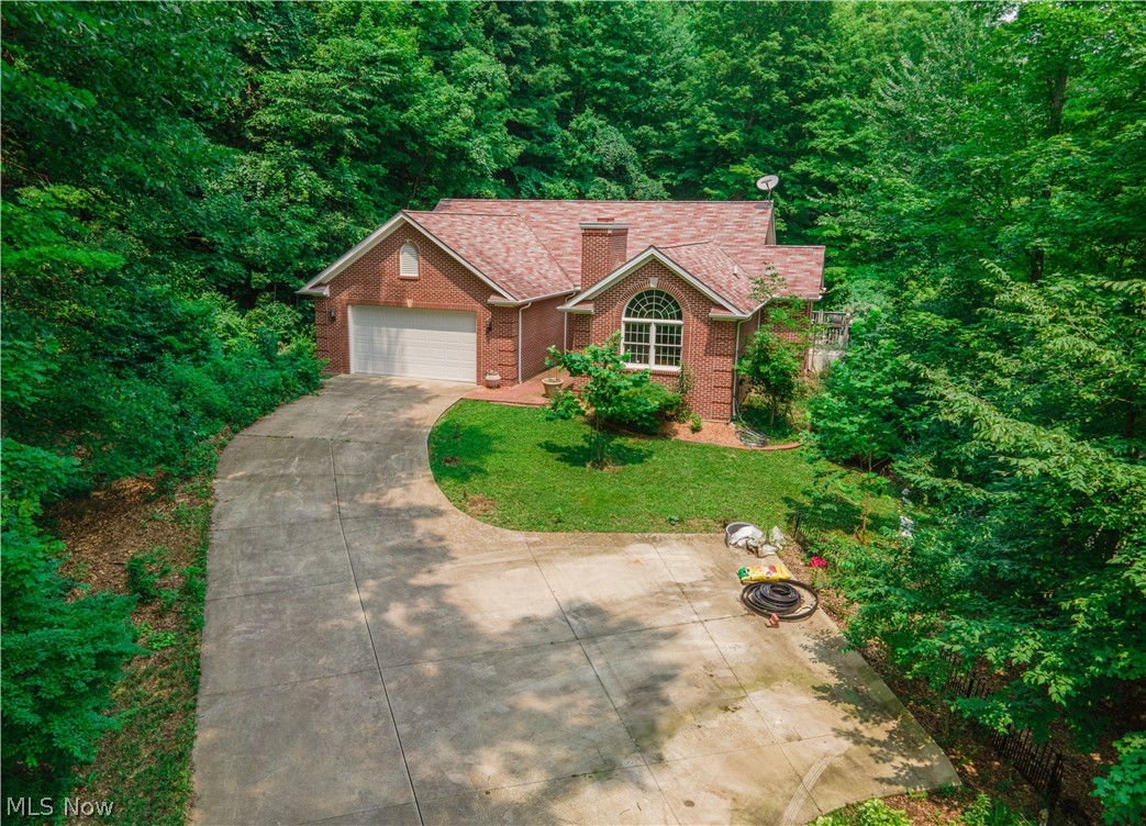 52130 Sperry Road Vermilion, OH 44089 - Photo 2 of 29 Long driveway with turn around leads to your home.