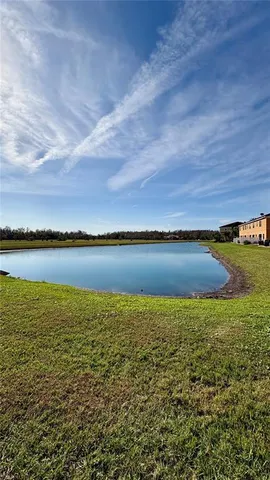a view of a big yard with an outdoor space
