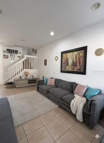 a living room with furniture and a couch