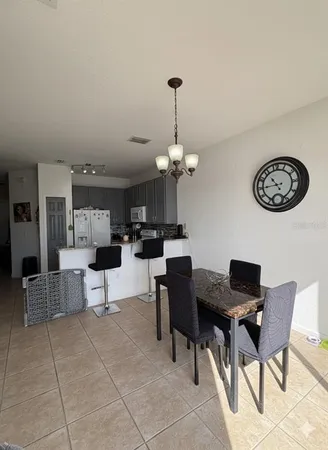 a view of a livingroom with furniture and window