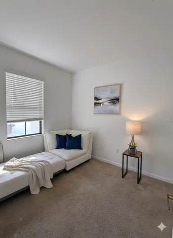 a bathroom with a double vanity sink toilet mirror and shower