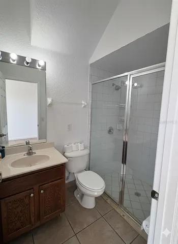 a bed room with a bed and a window