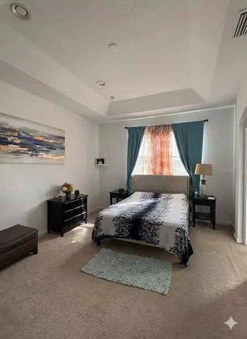 a bathroom with a double vanity sink and mirror