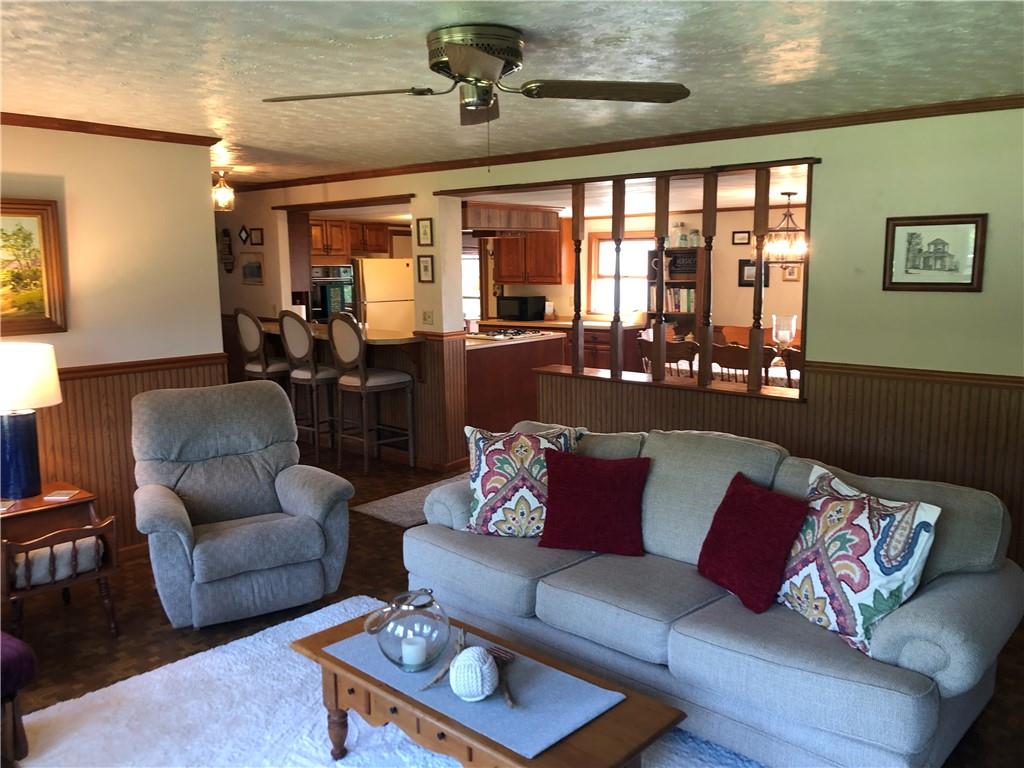 230 Locust Road Addison, PA 15411 - Photo 15 of 43 a living room with furniture and a large window