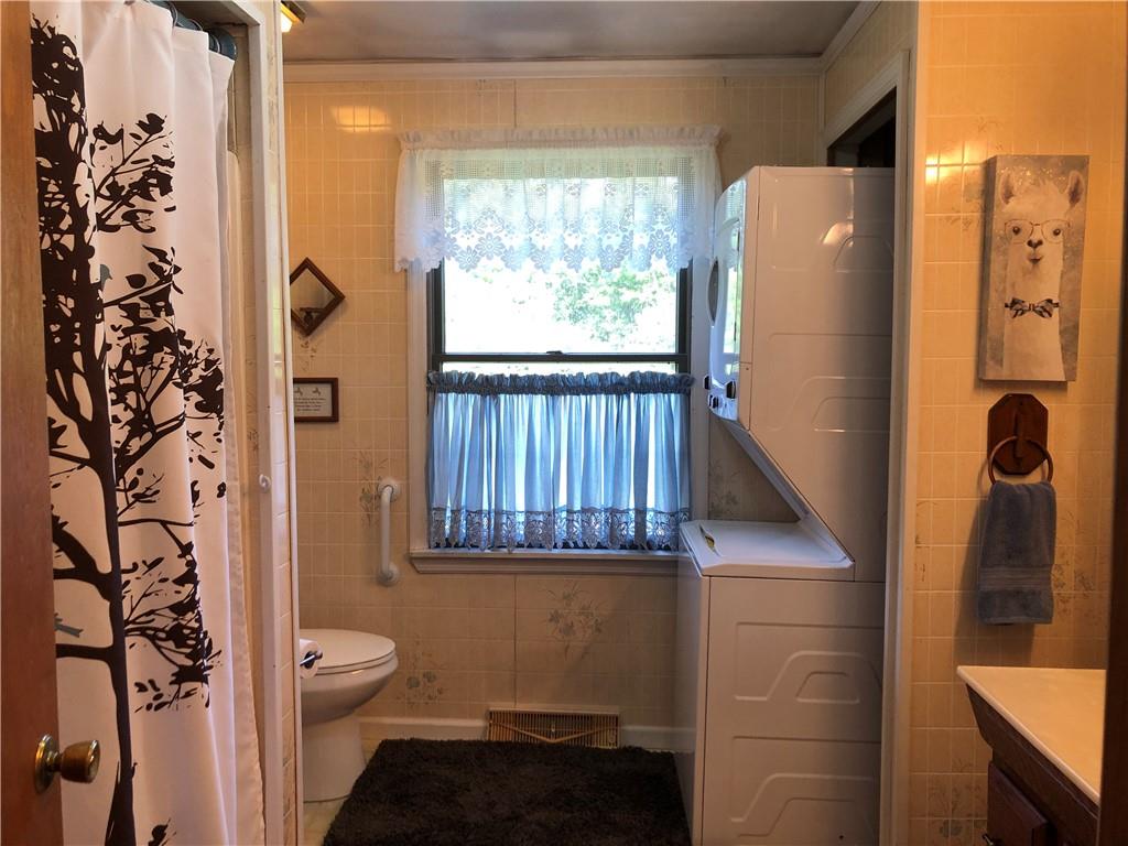 230 Locust Road Addison, PA 15411 - Photo 25 of 43 a bathroom with a toilet and a shower