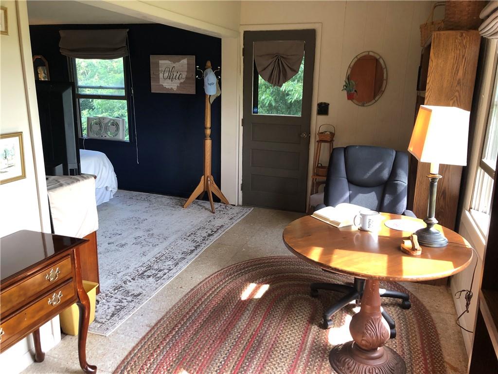 230 Locust Road Addison, PA 15411 - Photo 28 of 43 a view of a livingroom with furniture window and wooden floor
