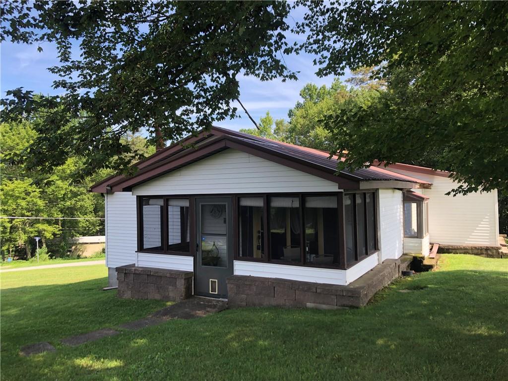 230 Locust Road Addison, PA 15411 - Photo 3 of 43 a view of front of a house with a yard