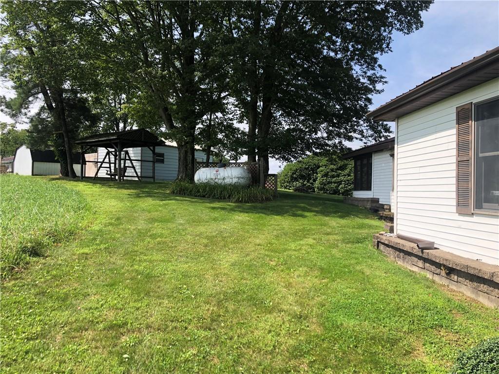 230 Locust Road Addison, PA 15411 - Photo 34 of 43 a view of a house with a yard