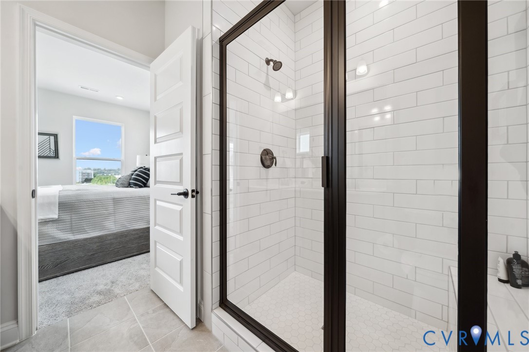 16116 Esteem Way Midlothian, VA 23113 - Photo 20 of 44 a bathroom with a shower and a sink
