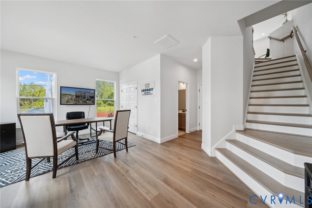 16116 Esteem Way Midlothian, VA 23113 - Photo 2 of 44 a view of a dining room with furniture and wooden floor