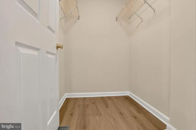 a view of small space with racks on the wall