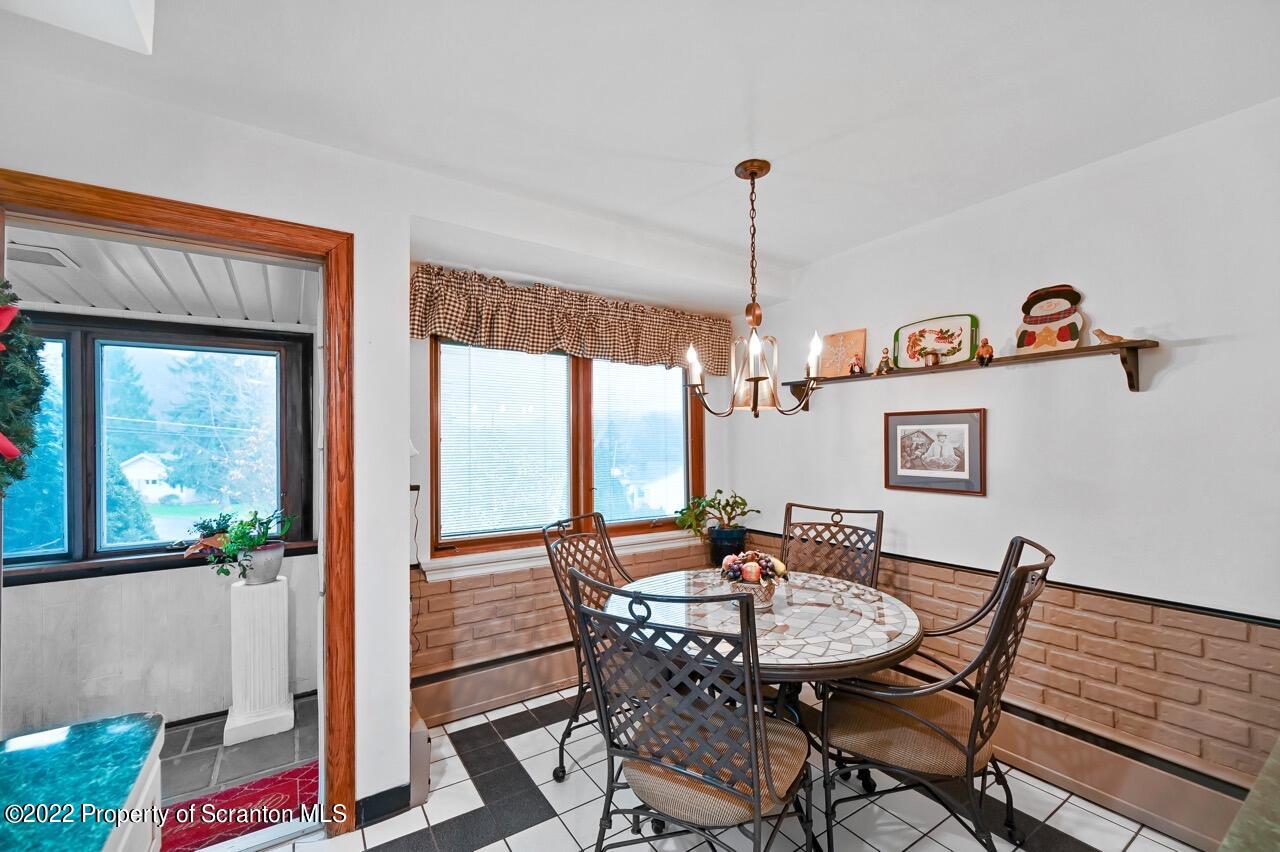807 Layton Road Clarks Summit, PA 18411 - Photo 27 of 73 a view of a dining room with furniture window and outside view