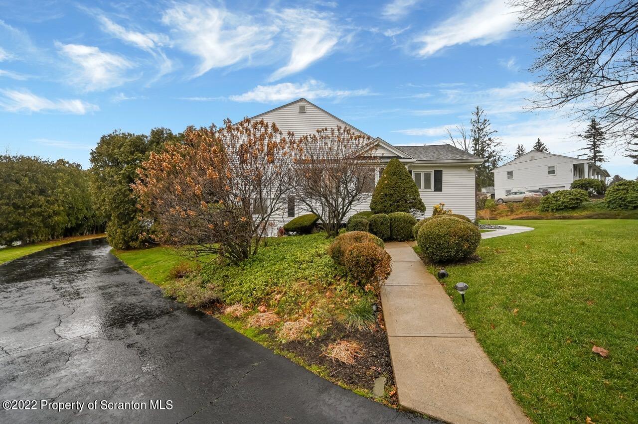807 Layton Road Clarks Summit, PA 18411 - Photo 3 of 73 a view of a garden with a pathway