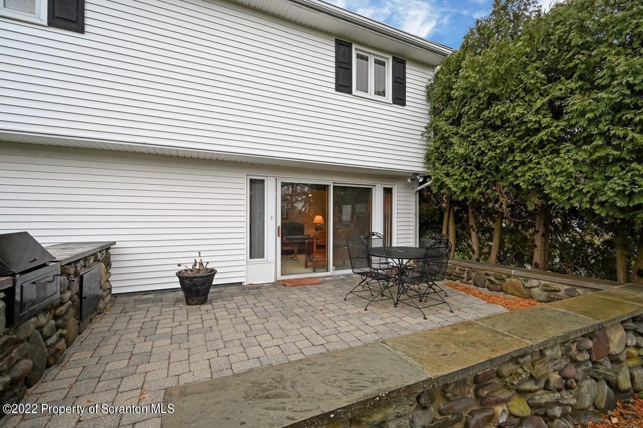 807 Layton Road Clarks Summit, PA 18411 - Photo 35 of 73 a view of a house with chairs in patio