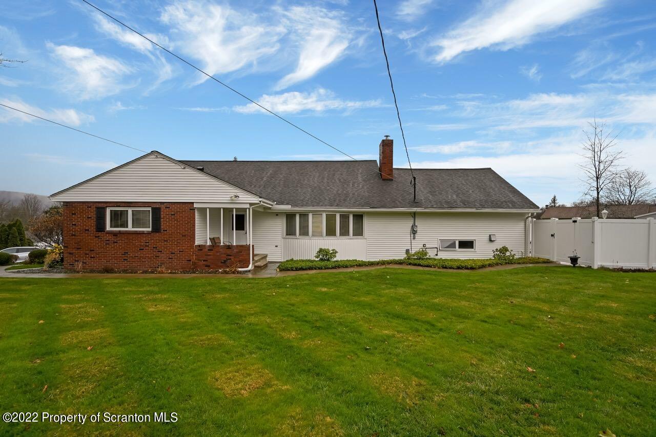 807 Layton Road Clarks Summit, PA 18411 - Photo 67 of 73 a front view of a house with a garden