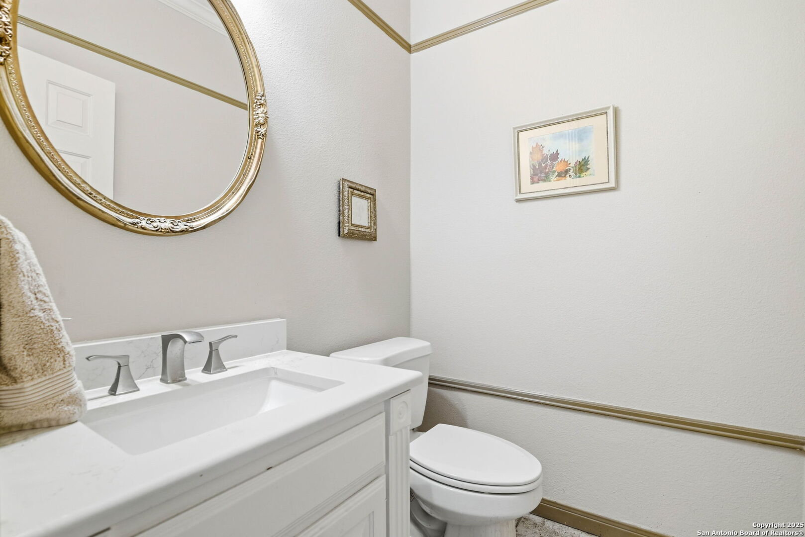 15 Inwood Point San Antonio, TX 78248 - Photo 15 of 27 a bathroom with a sink a mirror and a toilet