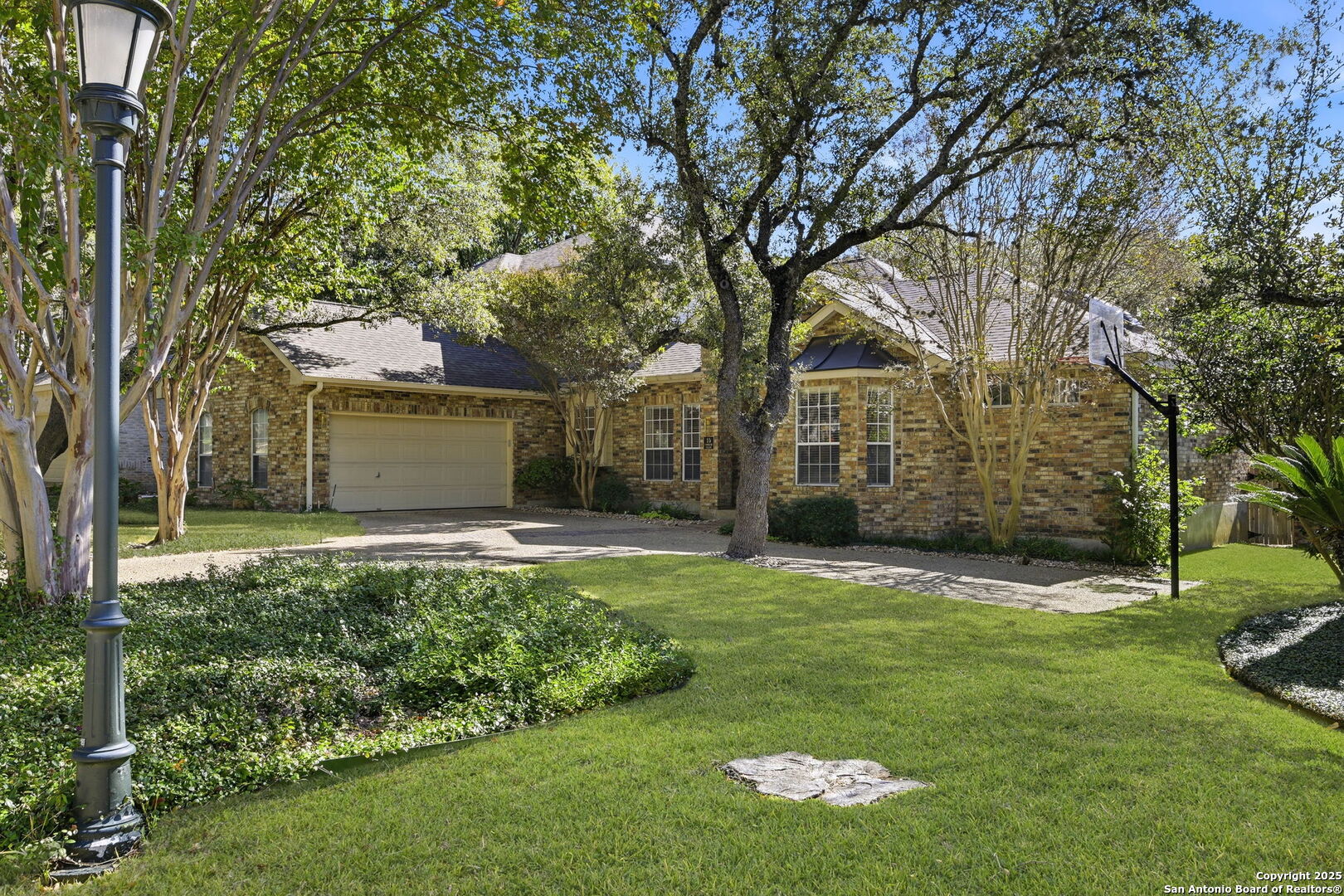 15 Inwood Point San Antonio, TX 78248 - Photo 2 of 27 a backyard of a house with lots of green space