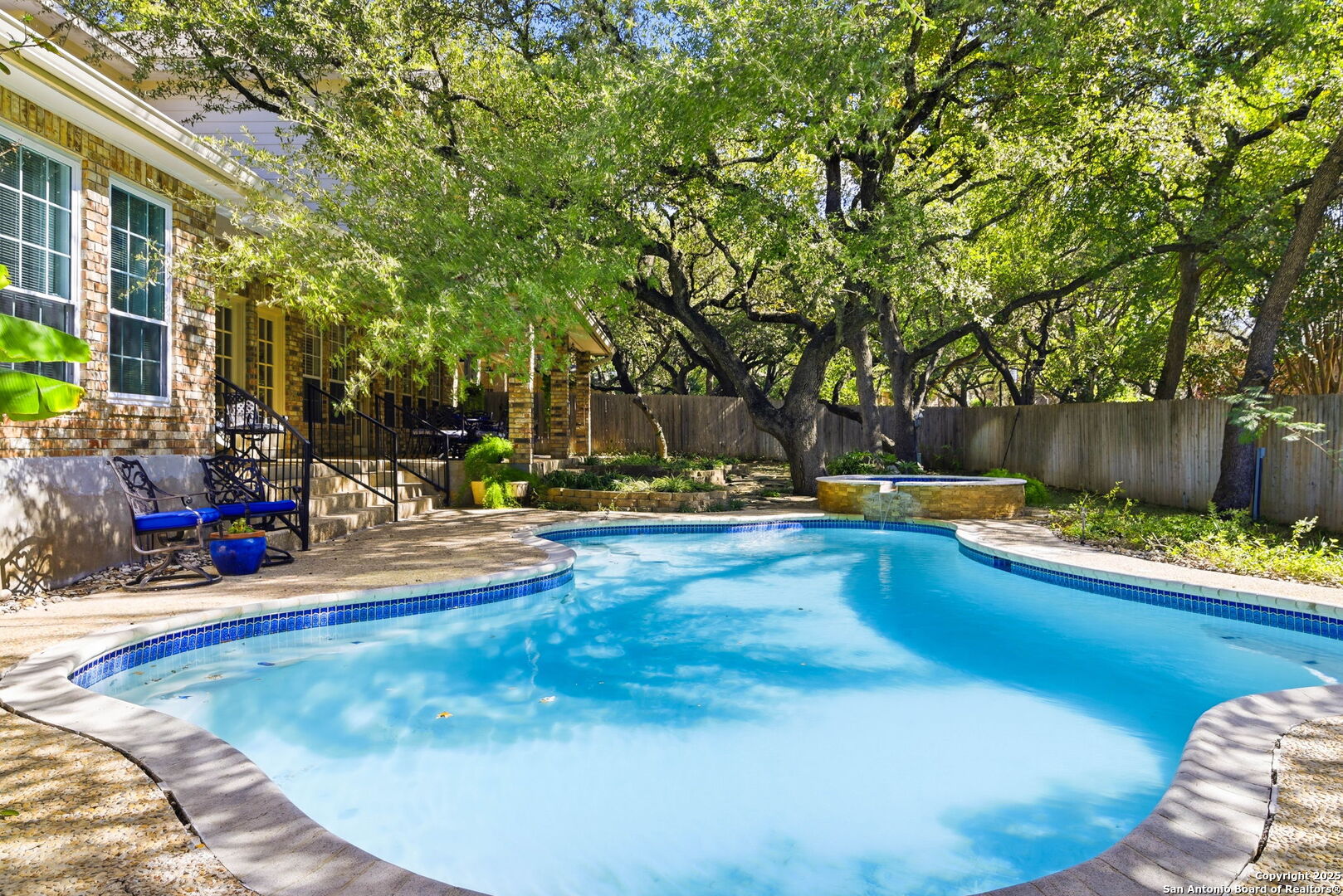 15 Inwood Point San Antonio, TX 78248 - Photo 22 of 27 a view of a swimming pool with chairs