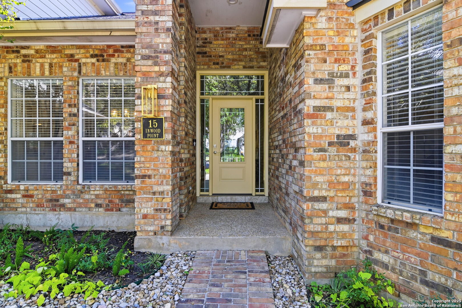 15 Inwood Point San Antonio, TX 78248 - Photo 3 of 27 a view of a brick buildings with large windows