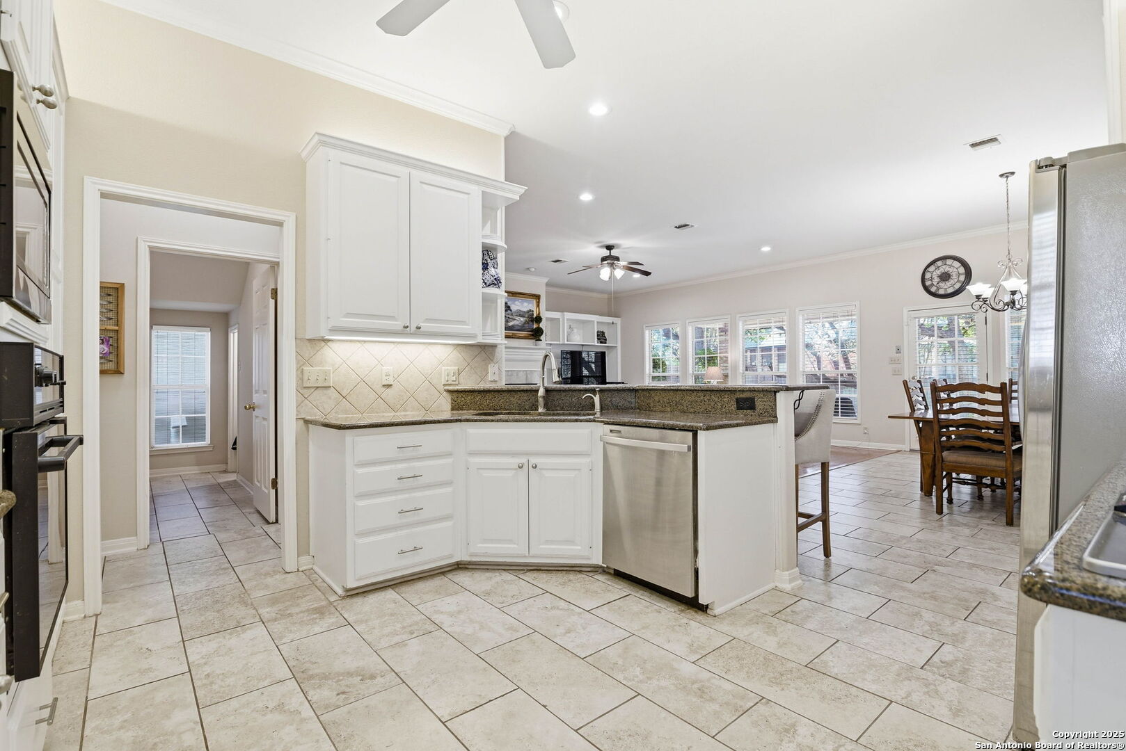 15 Inwood Point San Antonio, TX 78248 - Photo 8 of 27 a kitchen with cabinets and chairs