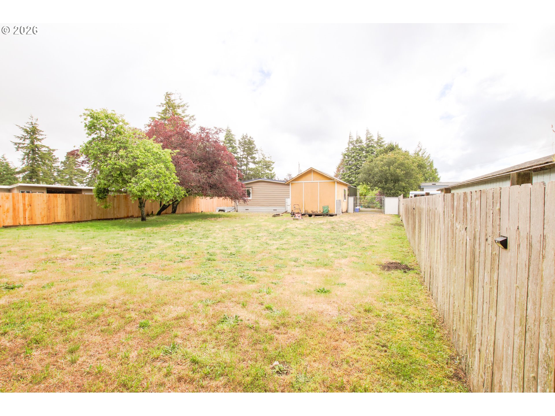 1431 Maple Street Florence, OR 97439 - Photo 39 of 43 a view of a swimming pool with an outdoor space and seating area