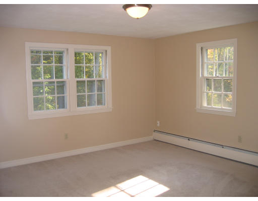 23 Forrest Road Topsfield, MA 01983 - Photo 6 of 20 an empty room with a window