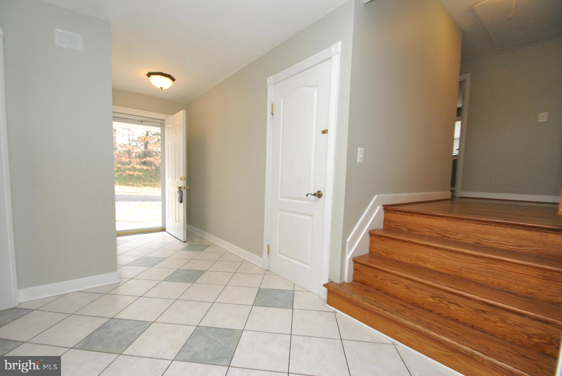 4713 Ballygar Road Nottingham, MD 21236 - Photo 3 of 30 CUSTOM CERAMIC TILED FOYER ENTRANCE