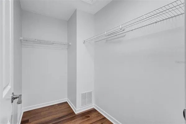 a bathroom with a sink toilet a shower and a mirror