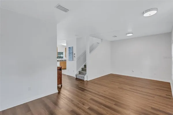 a bathroom with a sink toilet and a mirror