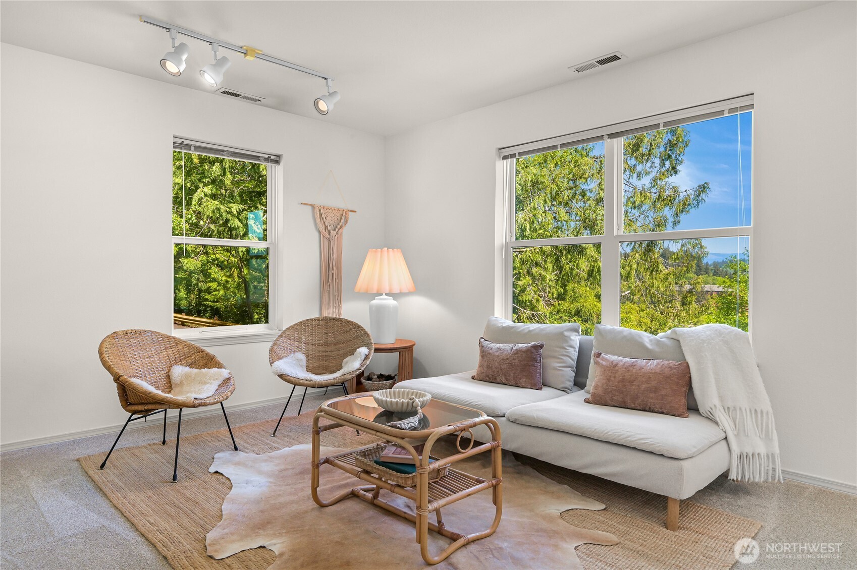 808 20th, Unit 208 Bellingham, WA 98225 - Photo 1 of 28 a living room with furniture and a large window