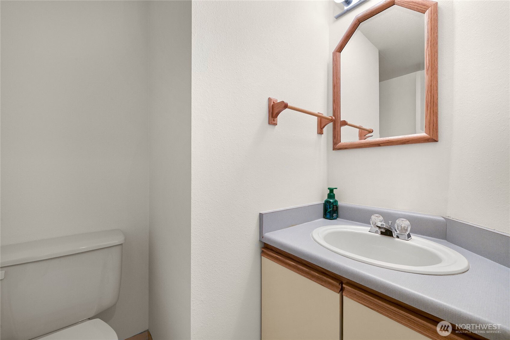 808 20th, Unit 208 Bellingham, WA 98225 - Photo 11 of 28 a bathroom with a sink and a toilet